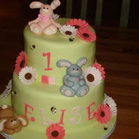 1St Birthday Bunnies This is the cake I made for my youngest daughter's first birthday. Went with bunnies because she always carries this little velveteen...
