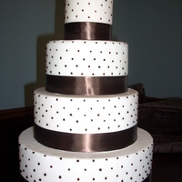 Pink And Brown pale pink fondant with brown dots and ribbon
