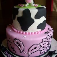 Cow Cake This was made for a 1st birthday party. I made a small smash cake for the birthday girl.