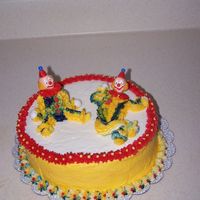 Course 1/cake #2 1st time I've done a clown cake. I really enjoyed making this one. It's a one layer almond with vanilla cream cheese frosting. I...