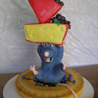 Whooops!!!! The "pie" and cheeses are all fondant covered pound cake. Remy the little chef is rice cereal marshmallow treats covered in...