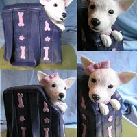 Diva Doggy This is pound cake filled with buttercream and coverd in fondant. The puppy"s head is RKT and ears are gumpaste. It was covered in...