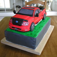 F-150 Pick-Up Truck Groom's Cake This was the second attempt at a vehicle( after I got Mike McCarey's DVD)!! This turned out fine and the groom loved it. It is pound...