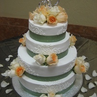 My First Wedding Cake! 4 tier, 16", 14", 10" and 8". white, banana, and vanilla cakes with strawberry filling. This was all possible only with...