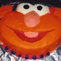 Zoe I attempted to make a Zoe cake using the Elmo pan, but it didn't come out quite right.