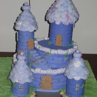 Castle The towers were made out of chocolate cake and the tiles are marble fondant.This cake was my first major cake that I made for nieces 9th...