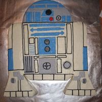R2D2 Cake A 2-D cake in the shape of R2D2. All buttercream icing.