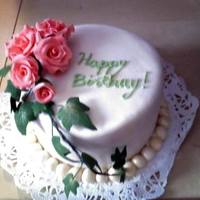 Peach Roses Birthday Cake LOL You know your tired when you misspell "birthday". I fixed it before it was picked up. Peach gumpaste roses and gumpaste ivy....