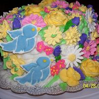 Course 2 My first attempt at the basket weave and Royal Icing Flowers. To many flower for my real taste, but great experience