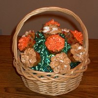Fall Cupcake Bouquet My first attempt at a cupcake bouquet. I made it for a lady in my mom's ceramics class at the local senior center. Yellow cupcakes...