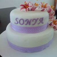 Stargazer Lily Cake made this for my friends mother. this was my very first attempt at making the lilies. i think they turned out pretty well.