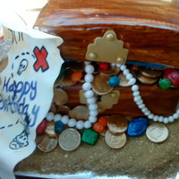 Treasure Chest Birthday made this for my husband's company's once a month birthday celebration for the month of August. The bottom cake is spice cake...