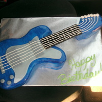 Electric Guitar Cake my little sister asked me to make this for her very musical boyfriend's birthday.