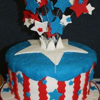 4Th Of July 10" round carved to tapper slightly, all covered in fondant. Red Velvet and French Vanilla with blue colored BC.