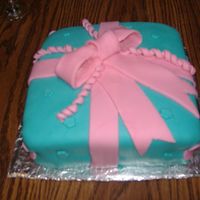 Birthday Present Cake My 2nd birthday present cake. Coconut w/ coconut filling. TFL:)