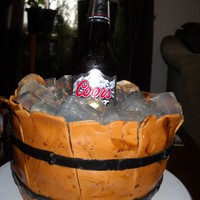Wooden Beer Barrel This was my first try at a beer barrel cake.I used unflavored gelatin refrigerated in ice cube trays for the ice cubes. Fondant wood panels...