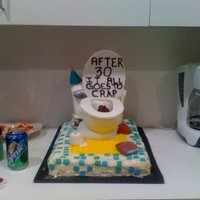 Toilet Cake! It's all edible! (except for the 'reeds' in the difuser)This was one of my first sculpted cakes. The bowl is rice krispie...