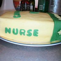 Nurse Book 2 This is a side angle of my sister's cake. I love her and wanted to do something fun for her graduation.