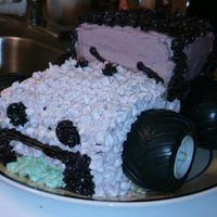 Jeep Cake This is my first attempt at a Jeep. It's 3 layers of yellow cake with vanilla pudding in between (birthday boy's request). The...