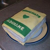 Nursing Book This is for my sister's graduation. She's a nurse in the NICU in TX. The cake is yellow with chocolate icing and covered in...