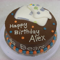 Xbox Cake This was for a man who, according to his wife, only had 2 loves. The Chicago Bears and his Xbox. =) she described to me exactly what she...