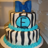 Blue Zebra this was a replaca of another cake i did (it was pink and zebra).marble cake with buttercream and fondant accents