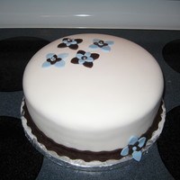 Simple Birthday Cake Birthday cake for a co-worker. Fondant covering, vanilla rum cake.