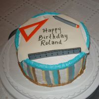 Architect Birthday Cake Made this cake for my brother who is an architect. He was really suprised with it...really loved the triangle!! Pineapple cake w/cream...