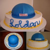 Tonka Hat This cake was for a friend who just graduated with his second degree. His faternity name is tonka, hence the tonka hat with the school'...