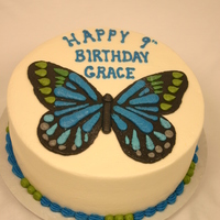 Butterfly Invitation The butterfly is copied from the invitation for this chocolate cake with white icing.