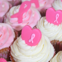 3-Day Breast Cancer Cupcakes Strawberry cupcakes with almond buttercream and a candy ribbon or heart. These were made as a fundraiser for the Breast Cancer 3-Day walk...