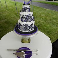Lady In Black Lace This cake only served about 50 people for a small wedding. The bride said that she didn't like cake and just wanted it for pictures...
