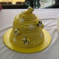 Bee Hive 80th Birthday cake for the lady who sells honey at the farmer's market I sell at. Chai tea cake with honey cinnamon SMBC. Fondant bees...