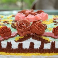 First Square Cake With Flowers The cake cracked. Tried to seal it with butter cream. Made rose flowers for the first time. Consistency was not so good and the petals have...