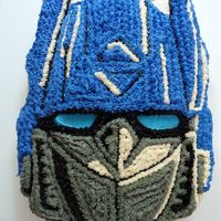 Optimus Prime Transformers Cake My son was begging me to make him a Transformers cake and saw a picture of this cake made by someone else and said he wanted that. So I...