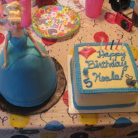 Cinderella! Doll is only thing inedible on both cakes. Strawberry cake with buttercream. Accents in royal icing and gumpaste.