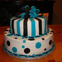 Sweet 16 This cake is all buttercream with fondant accents. It's for a Black/White Sweet 16 where the birthday girl wore turquoise.