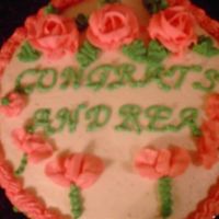 Cake_For_Grad.jpg Cake was made for a co-worker who graduated from college. I'm still learning!!