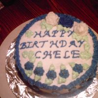 My_Second_Cake.jpg Second cake I made since taking a cake decoration class. Chocolate cake with Buttercream icing. I am still practicing on getting my roses...