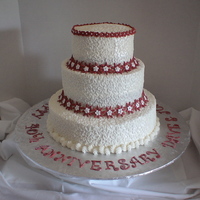 40Th Anniversary Cake 40th anniversary cake for my friends June and Dave. 6", 9", & 12" airbrushed pearl buttercream with fondant accents. TFL...