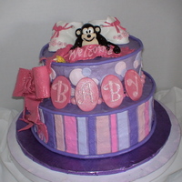 Monkey Baby Cake Made for a friend having a baby girl, who likes monkeys. 8 and 10 inch yellow/pound cakes filled and iced with buttercream then airbrushed...