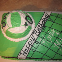Volleyball Two layer white cake with whipped icing.
