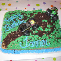 Monster Truck 7Th Birthday This was a single layer marble, chocolate and white, cake with buttercream icing.