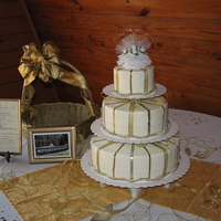 50Th Anniversary Cake This is a buttercream covered cake and has a "princess" filling which is bananas, strawberries, & custard.