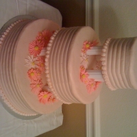 Pink Daisy Wedding Cake 1st attempt at a wedding cake, used exposed tiering for easy travel (5 hour trip) and set up. It's not perfect, but I think my cousin...