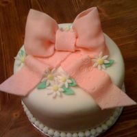 Fondant Bow My first fondant cake! Bow and daisies, for a baby girl shower.