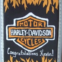 Harley Davidson Cake Iced in black buttercream and piped logo. flames in fondant