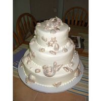 Seashell Cake 3 tiered cake in buttercream with chocolate seashells