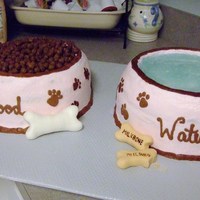 Dog Food & Water Bowl This was done for an animal fundraiser. food is cocoa puffs and the water is tinted piping gel. The paws are all hand piped and then...
