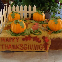 Pumpkin Patch The Base is sour cream pound cake. The pumpkins are pumpkin spice with pumpkin filling and white chocolate ganache. Fence is gumpaste all...